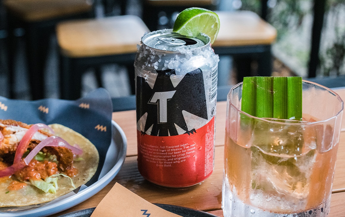 a beer topped with salt and lime